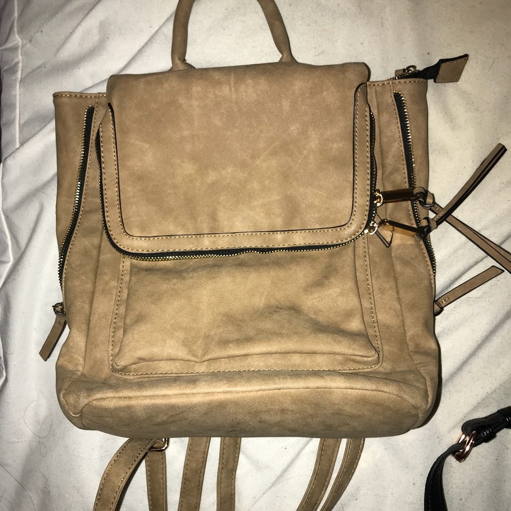 Tan Backpack.